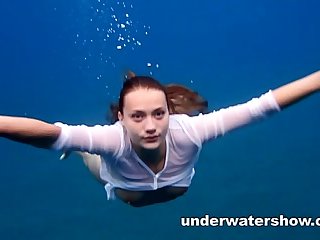 Julia swimming nude in the sea